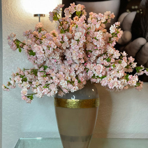 "Goddess" vase with pink cherry blossoms